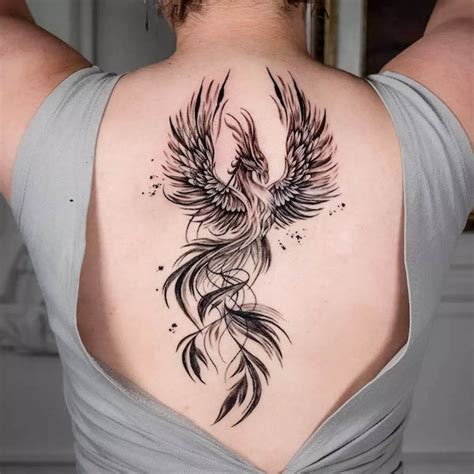 female beautiful phoenix tattoo|realistic phoenix tattoo.